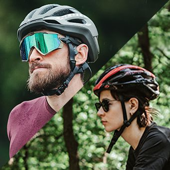 Homem e mulher utilizando o Capacete Ciclismo MTB Giro Revel In-Mold com Viseira
